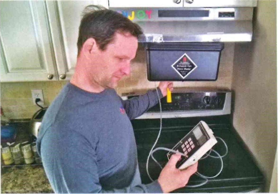 A Man Doing Home Performance Diagnostics in Toronto, ON 