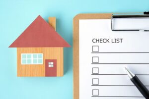 Checklist for a home inspection, detailing essential areas to evaluate for property condition and safety.